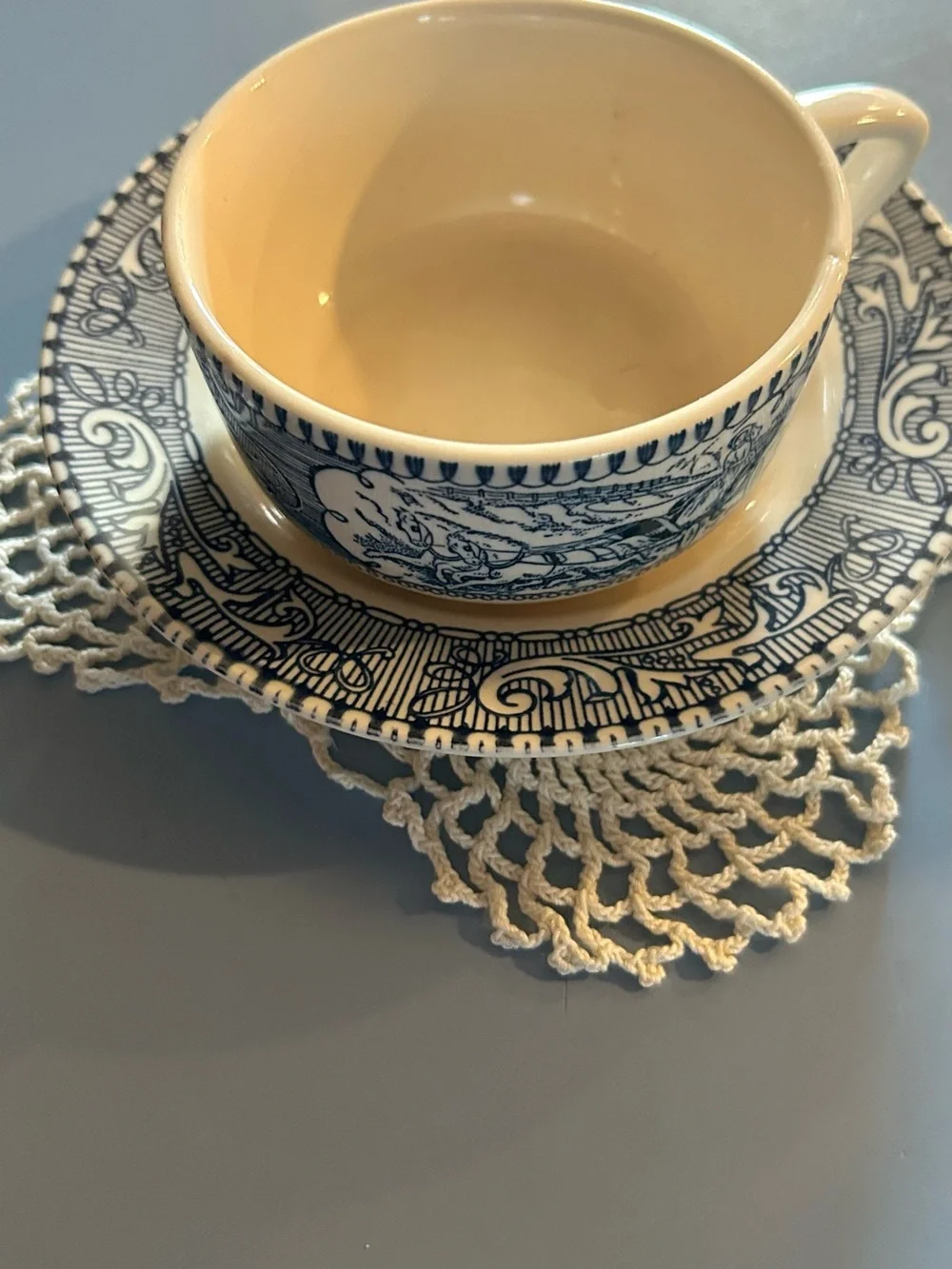 Blue and White Porcelain Teacup with Matching Saucer